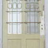 Front door from the 1920s and 1930s with grille